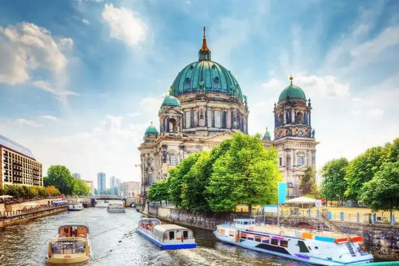 Buildings of Parliament in Germany along the canals on a sunny day.