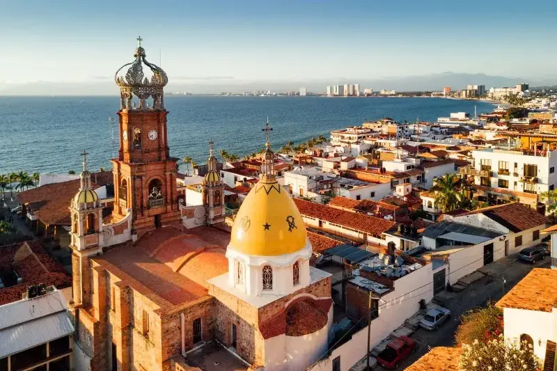 Small village on the coast of Mexico right on the water on a sunny day.