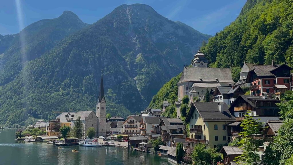 Beautiful town in Halstatt Austria with the mountains in the background.