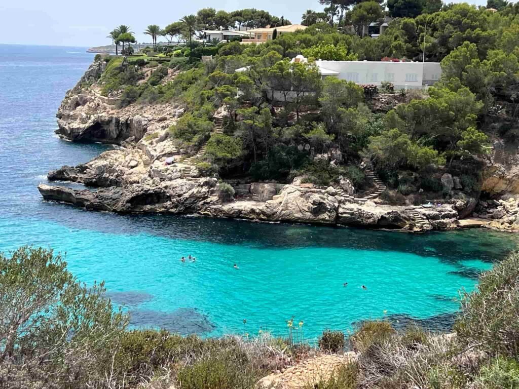 Cove in Mallorca with the turquoise water on a sunny day. 