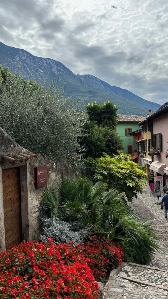 Houses filled with plants and flowers in Lake Garda.