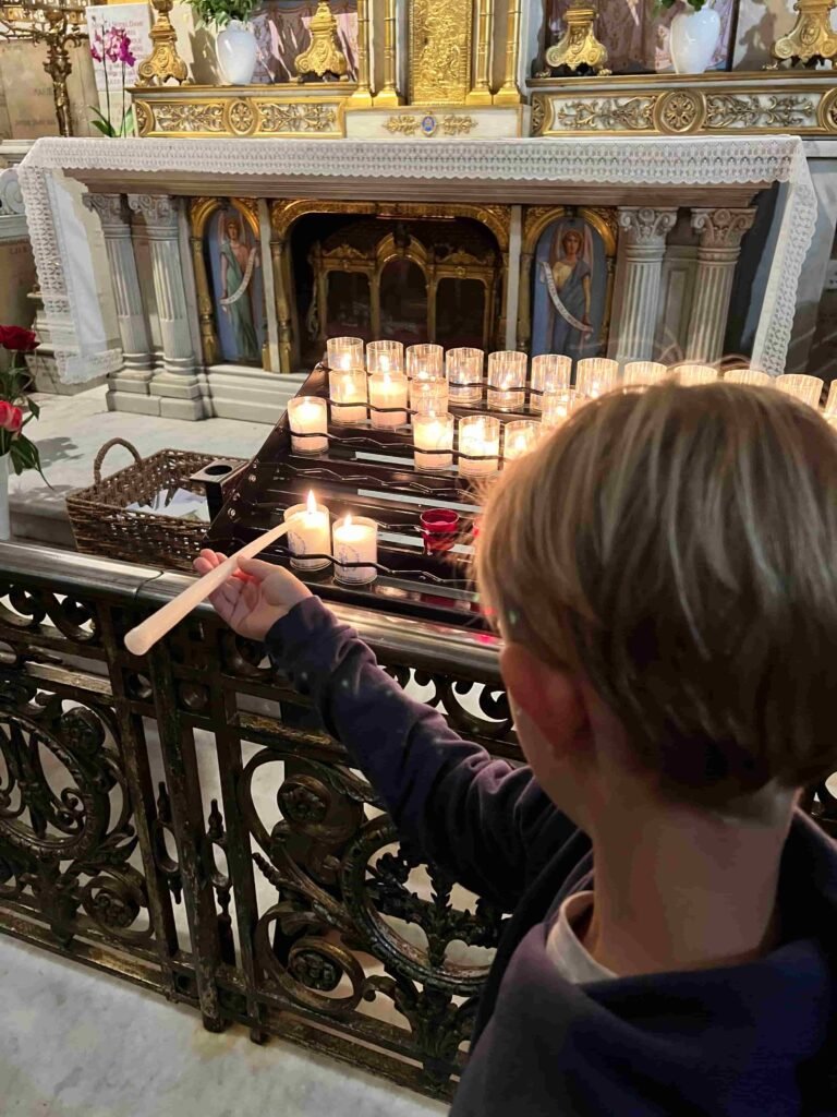 Lighting a Candle Notre Dame Paris